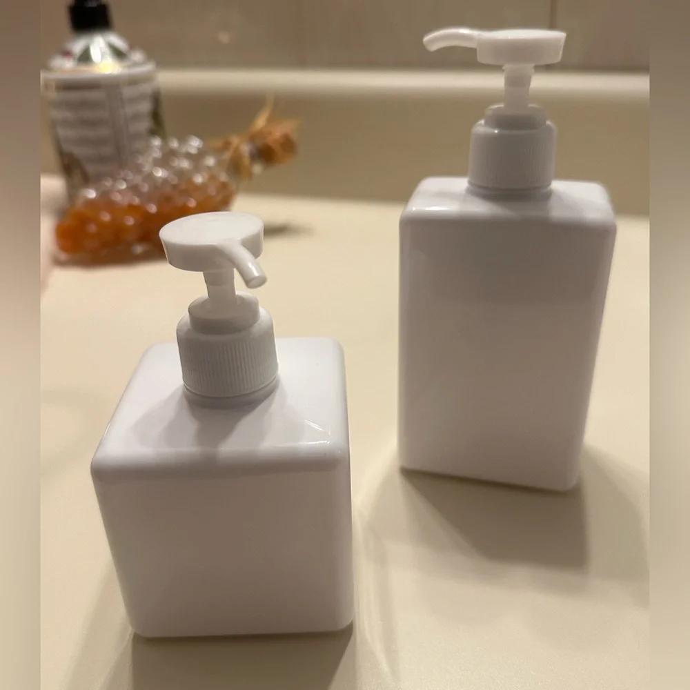Two Different Size Plastic Soap Dispensers (not filled)